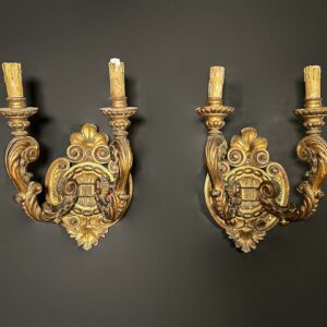 Coppia di applique dorate intagliate