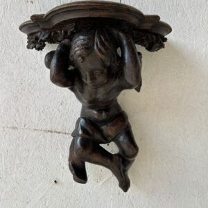 mensola in legno scolpito